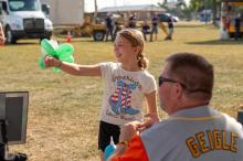 Young member with her balloon art