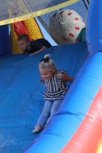 Young member on bounce house