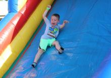 young member on bounce house