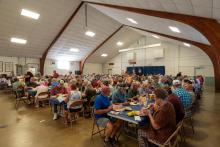 members gather for meals